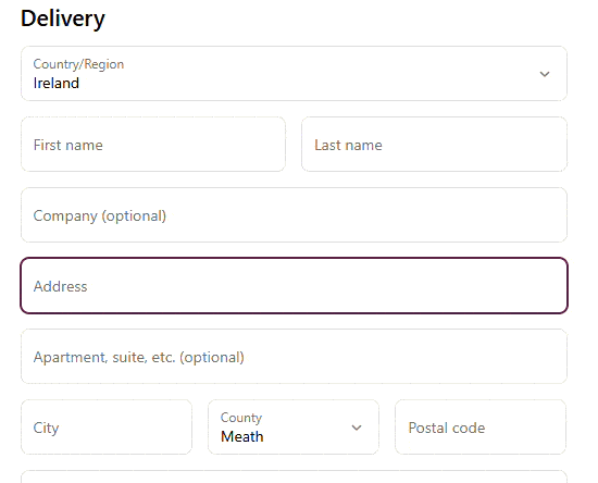 Delivery address form with Ireland selected; fields for first/last name, company (optional), address, apartment (optional), city, county Meath, and postal code.