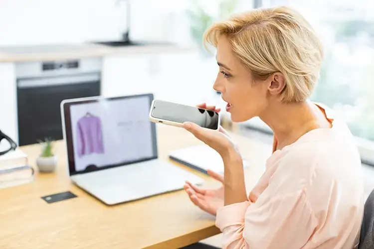 person speaking to a customer service rep on the phone about a delivery issue